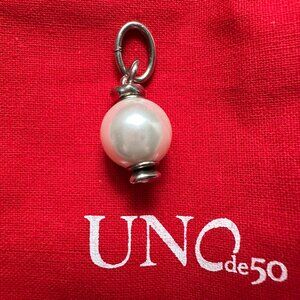 Uno de 50 charm